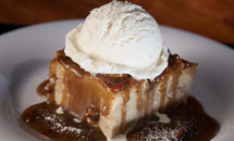 Housemade Bread Pudding with Praline Sauce